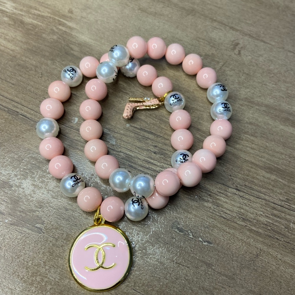 Baby pink and charm bracelet